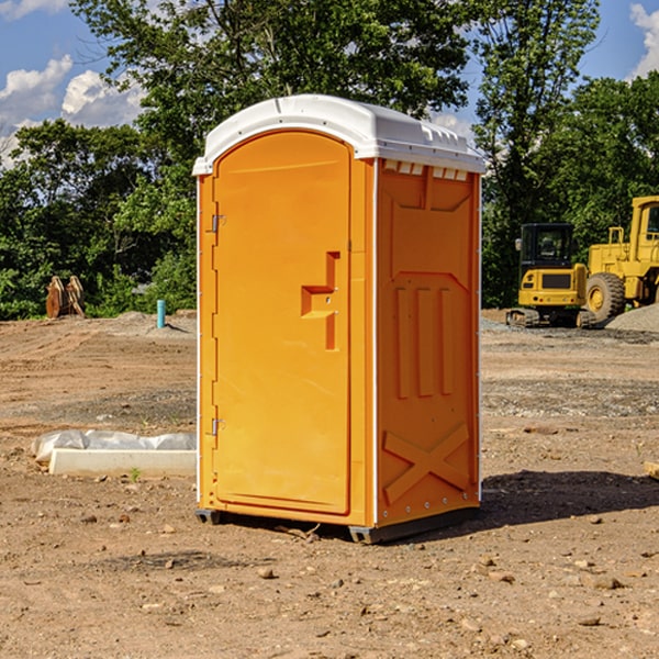 what is the cost difference between standard and deluxe portable toilet rentals in Meldrim